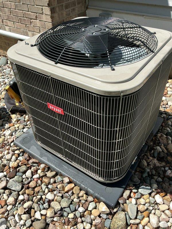 Completed annual cooling maintenance on residential air conditioning system. Performed comprehensive inspection of outdoor condensing unit, verified proper operation of condenser fan and compressor, checked refrigerant line insulation integrity, and confirmed unit was level on concrete pad with adequate clearance. Removed minor debris from surrounding area, inspected electrical connections, and documented equipment condition with photographs showing unit in good operating condition with clean coils and proper installation.