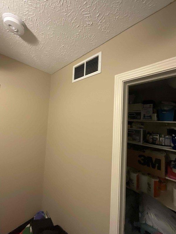 Conducted site assessment for potential mini-split installation to address inadequate cooling on second floor. Evaluated existing HVAC infrastructure, including current vent placement and ceiling configuration. Documented interior conditions and measured installation pathway for refrigerant lines and electrical routing from proposed indoor unit location to potential roof-mounted condenser placement.