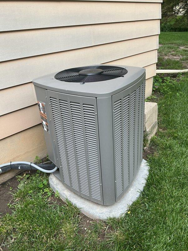Completed annual cooling maintenance on residential split system air conditioning unit. Performed comprehensive inspection of outdoor condenser unit, verified proper operation of fan motor and compressor, checked refrigerant levels, and cleaned condenser coils. Replaced furnace filter and humidifier pad as part of scheduled preventive maintenance. All components operating within normal parameters upon completion of service visit.