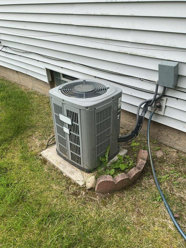 Completed annual preventive maintenance on residential split system air conditioning unit. Performed comprehensive inspection of outdoor condenser unit including cleaning of coils, verification of electrical connections, refrigerant line inspection, and operational testing of compressor and condenser fan motor. All components found operating within normal parameters with no deficiencies noted.