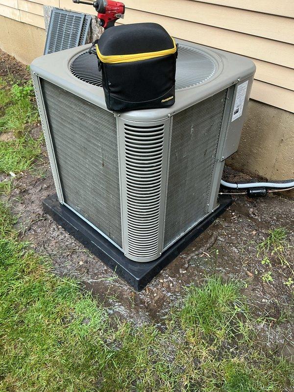Responded to service call for Bryant air conditioning system reported to be making loud noise. Performed comprehensive AC tune-up including inspection of condenser unit, electrical connections, and refrigerant levels. Cleaned condenser coils and checked fan motor operation. Verified system is operating within normal parameters. Unit tested and confirmed noise concern resolved. System running efficiently with no further issues detected at time of service completion.