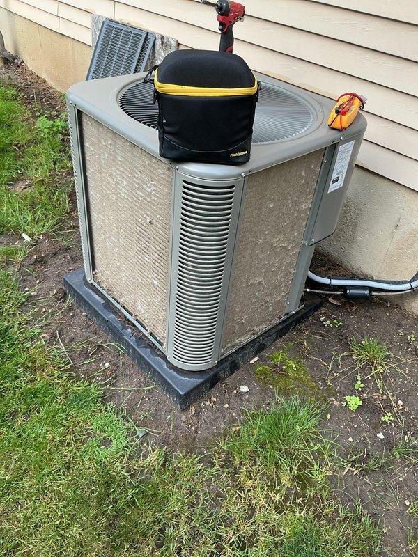 Responded to service call for Bryant air conditioning system reported to be making loud noise. Performed comprehensive AC tune-up including inspection of condenser unit, electrical connections, and refrigerant levels. Cleaned condenser coils and checked fan motor operation. Verified system is operating within normal parameters. Unit tested and confirmed noise concern resolved. System running efficiently with no further issues detected at time of service completion.