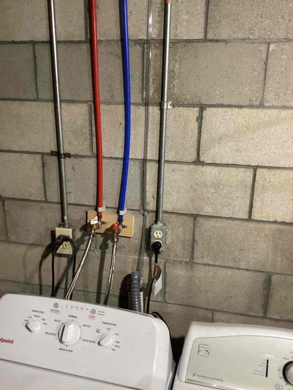 Successfully completed installation of a 2.5 ton air conditioning system with evaporator coil in basement mechanical room. Installed new AC condenser unit with rear discharge configuration, mounted new evaporator coil to existing Gibson furnace, and reconnected all refrigerant lines, electrical connections, and condensate drainage. All mechanical and electrical permits were obtained prior to installation, system was tested and verified operational upon completion.