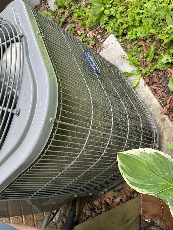 Completed annual cooling maintenance on Carrier air conditioning system. Inspected outdoor condenser unit, cleaned condenser coil fins to remove accumulated dirt and debris, replaced air filters, and checked evaporator pad. Unit operating within normal parameters upon completion of preventive maintenance service.
