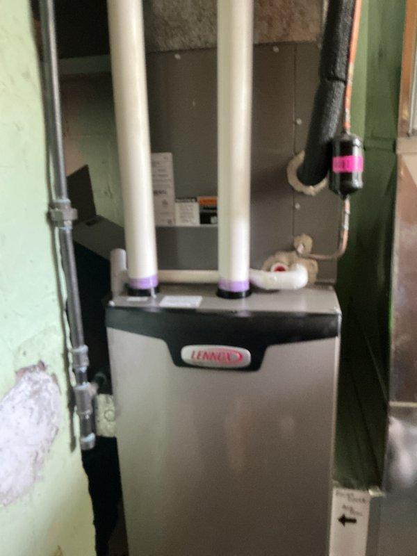 Completed annual HVAC maintenance on Lennox furnace system and inspected associated equipment including water heater and air handler. All units were photographed, inspected for proper operation, venting systems verified clear and secure, and equipment found to be functioning within normal parameters.