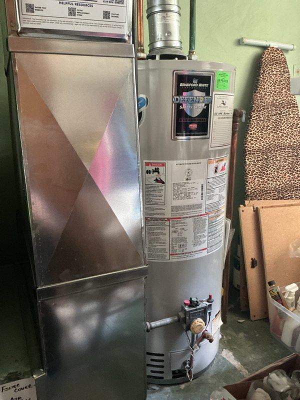 Completed annual HVAC maintenance on Lennox furnace system and inspected associated equipment including water heater and air handler. All units were photographed, inspected for proper operation, venting systems verified clear and secure, and equipment found to be functioning within normal parameters.