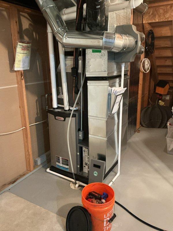 Completed annual cooling maintenance on Lennox GX35-24B-BF-20 air conditioning unit located in basement mechanical room. Performed comprehensive inspection of condenser unit, verified refrigerant levels and pressures, checked electrical connections and contactors, cleaned condensate drain lines, and inspected all piping connections including copper refrigerant lines and PVC drainage system. Tested system operation and airflow through ductwork, confirmed proper cycling and temperature differential across coil. All components found to be operating within manufacturer specifications with no deficiencies noted. Unit returned to normal service with optimal performance confirmed.
