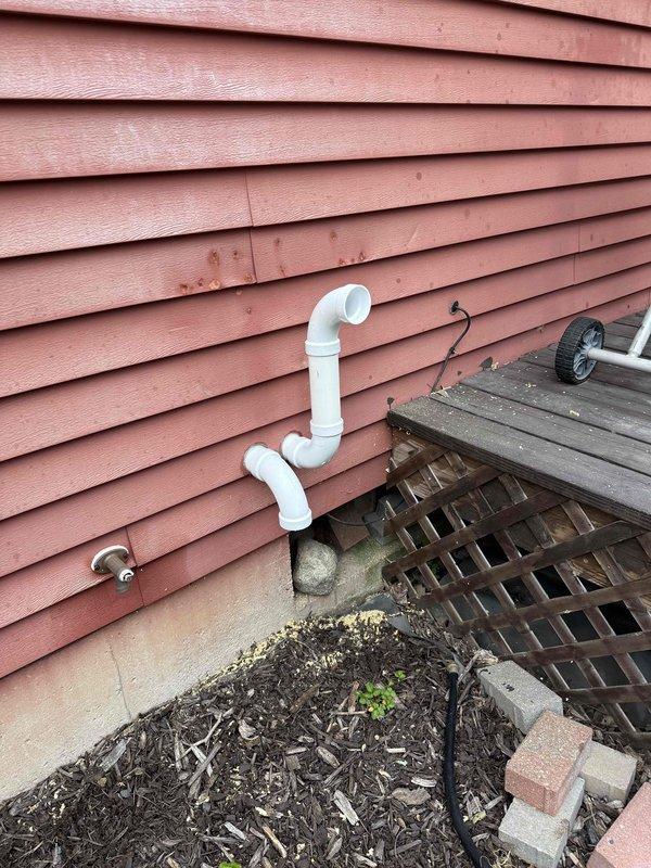 Completed full HVAC system installation including a Lennox 70,000 BTU furnace with coil and 2-ton air conditioning unit configured for right-side placement. Installed white PVC venting system routed through exterior wall with proper elbows and termination, mounted furnace on platform in basement utility area, and reconnected all necessary supply and return ductwork with black flexible connections. Obtained mechanical permit prior to installation and ensured all equipment properly labeled and secured per manufacturer specifications.