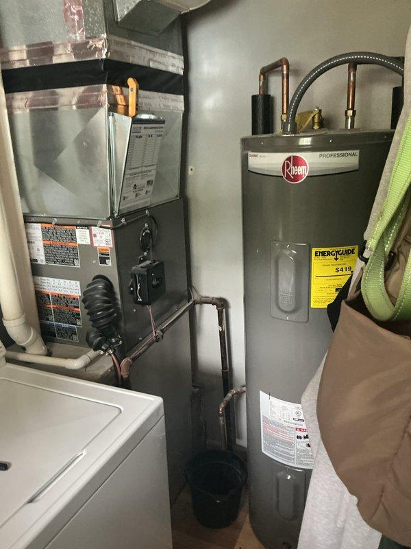 Completed annual cooling maintenance on residential HVAC system. Performed comprehensive inspection of furnace and air handling components, verified all safety labels and operational specifications were intact, and inspected condensate drain lines and PVC venting for proper function. System found in good operating condition with all mechanical components functioning within manufacturer specifications.