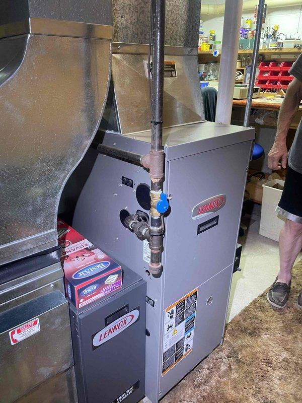 Provided estimate for air conditioning system replacement in basement location. Existing Lennox HVAC equipment is over 20 years old and not functioning properly. Assessment included evaluation of current furnace, air handler, ductwork configuration, and metal piping connections with existing infrastructure.