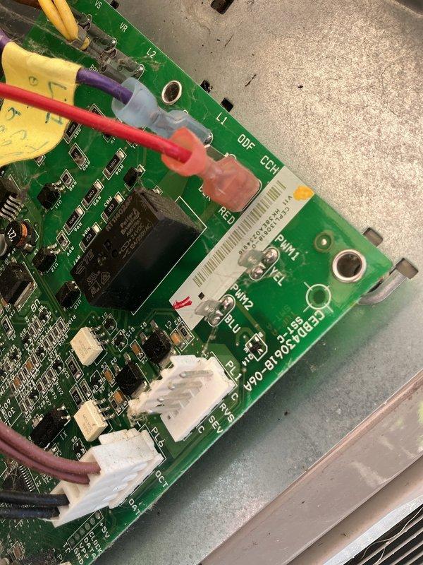 Responded to non-operational air conditioning system that had been inoperative for approximately one year. Upon diagnostic inspection of 1995 vintage equipment located in basement, identified failed control board as primary cause of system failure. Visual inspection revealed corroded capacitor terminals with white crystalline deposits and rust-colored deterioration on motor component, indicating electrical degradation. Control board displayed multiple wire connections across various terminals with visible wear on PCB components. Documented equipment condition through photographic evidence showing extent of component deterioration and recommended complete control board replacement to restore system functionality.