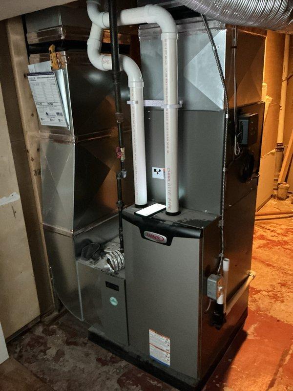 Completed scheduled annual maintenance on residential HVAC system. Inspected furnace unit, blower assembly, and air filtration system; verified proper operation of all mechanical components including gas valve, electrical connections, and condensate drainage system. Filter showed moderate dust accumulation and was assessed for replacement; all safety controls and system components found operating within normal parameters.