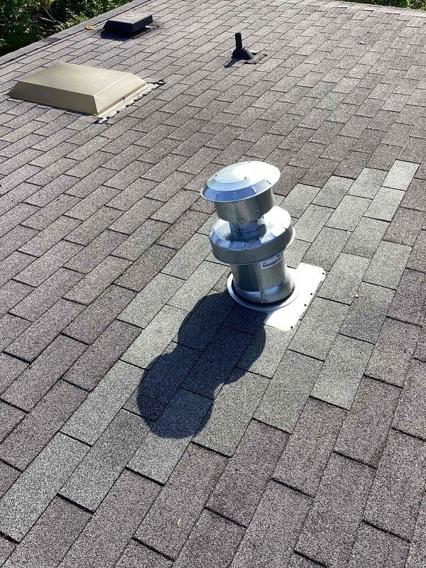 Coordinated with roofing contractor on-site to address potential roof jack recall issue. Temporarily removed metal roof vent and flashing assembly from asphalt shingle roof to allow roofer access for underlying roof deck repairs. Upon completion of roofing work, reinstalled roof jack with proper flashing and weatherproofing to ensure water-tight seal at penetration point.