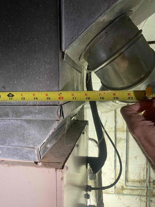 Responded to non-operational air conditioning system with aging HVAC equipment requiring full system replacement. Conducted comprehensive assessment of existing outdoor AC unit and basement furnace installation to determine replacement specifications. Performed detailed measurements of existing ductwork clearances and equipment dimensions to ensure proper sizing and fitment for new system installation. Provided estimate for complete HVAC system replacement affecting whole house comfort control.
