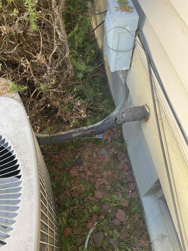 Responded to complete loss of cooling affecting entire home. Assessed existing outdoor condensing unit with unknown age and history of previous refrigerant line repair where line was cut and sealed. Documented current equipment condition and location. Provided comprehensive replacement estimate for new air conditioning system due to unit's compromised refrigerant system and uncertain service history.