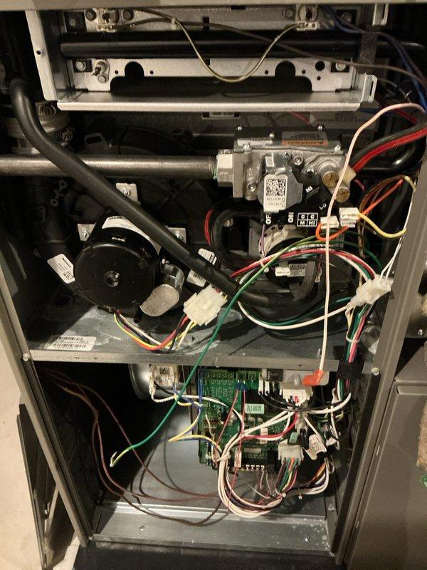 Completed annual HVAC maintenance inspection on furnace unit. Accessed internal components by removing front panel and performed visual inspection of heat exchanger, gas valve assembly, electrical connections, and control board. Inspected and documented condition of air filter, which showed signs of dust accumulation. All wiring connections, burner assembly, and electronic controls were examined for proper operation and safety compliance.