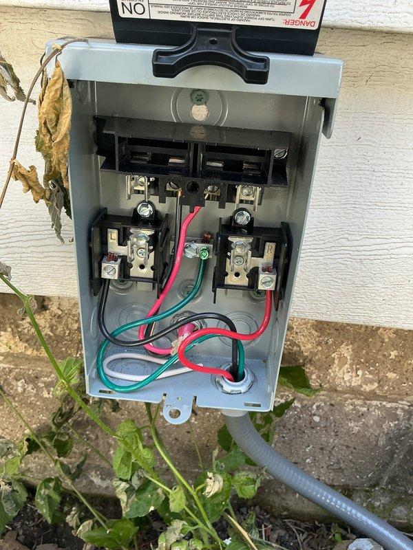 Responded to no cooling call on brand new central air conditioning system. Upon arrival, verified thermostat display showing 78°F and checked system operation. Inspected outdoor disconnect box and found proper electrical connections at terminal blocks with all wiring intact. Diagnosed issue as outdoor unit not receiving power due to disconnect being in off position. Switched disconnect handle to on position, restoring power to condensing unit. Verified system startup and proper operation with unit cycling normally. Confirmed cooling mode engaged and system functioning as designed.