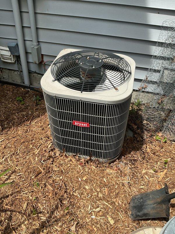 Completed annual cooling maintenance on Bryant air conditioning system. Replaced air filter, inspected condensing unit exterior condition and evaporator coil which showed significant corrosion and oxidation on copper refrigerant lines indicating age-related deterioration. All components operational at time of service completion.
