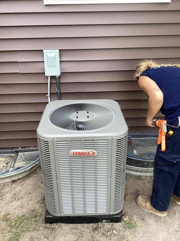 Completed full HVAC system installation including a 2-ton Lennox air conditioning condenser unit and evaporator coil. Positioned outdoor condenser on concrete pad with proper clearances, installed new electrical disconnect box and ran conduit to unit, established new dedicated electrical circuit per code requirements. Installed indoor evaporator coil, connected refrigerant lines, completed all necessary ductwork connections, and mounted new digital programmable thermostat on interior wall. Obtained mechanical and electrical permits prior to installation, performed system startup, verified proper refrigerant charge and airflow, and tested all components for optimal performance.