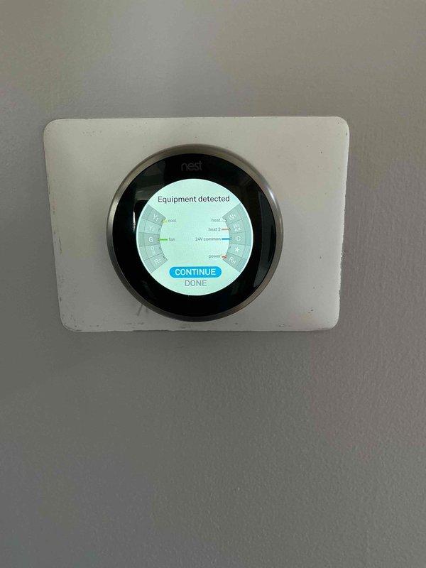 Responded to service call for Nest Gen 3 thermostat experiencing intermittent power issues. Customer had previously replaced thermostat but continued to experience loss of constant power to the unit. Upon arrival, inspected thermostat wiring connections at both the wall plate and the Amana furnace to diagnose power supply inconsistencies. Verified equipment detection process was active on thermostat display, indicating system was attempting to communicate with HVAC equipment. Evaluated C-wire (common wire) connection to ensure continuous 24V power supply to thermostat, as Nest thermostats require constant power for proper operation. Traced low-voltage wiring from thermostat location to furnace control board to identify any loose connections, damaged wiring, or inadequate power delivery that would cause thermostat to lose power intermittently.