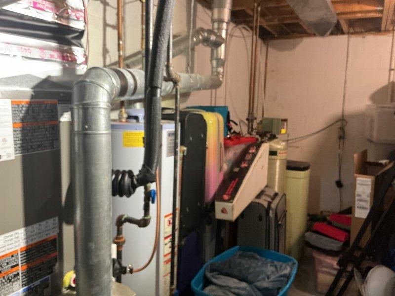 Successfully installed a 3-ton air conditioning unit with matching evaporator coil in left-side configuration. Completed all mechanical and electrical connections, reconnected system components, and ensured proper operation of the new HVAC equipment in the basement utility area.