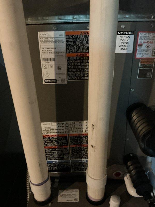 Completed annual cooling maintenance on Lennox air handler unit. Inspected system components and found air filter heavily soiled with dust accumulation, restricting airflow. Replaced dirty pleated filter with new filter to restore proper system operation and efficiency. Verified condensate drain lines clear and all warning labels intact. System operational and ready for continued cooling season use.