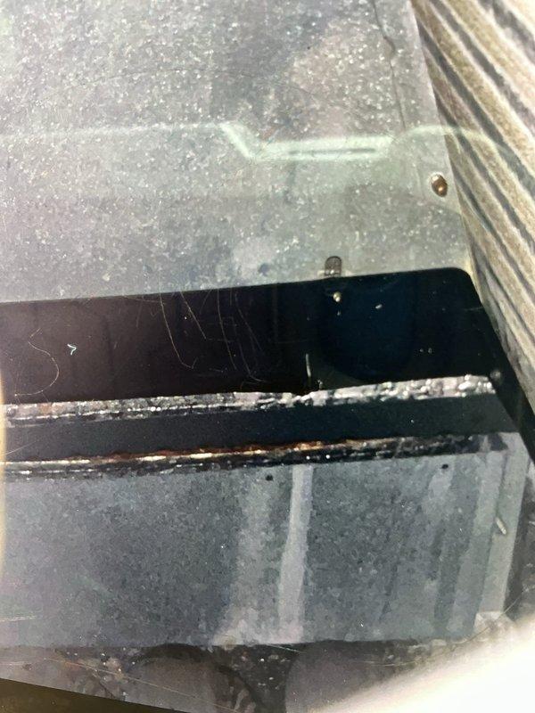 Responded to water leak issue at furnace location. Upon inspection, discovered condensate drainage system blockage preventing water from reaching the condensate pump despite pump operating normally. Identified corroded metal components and compromised PVC condensate drain connections causing water accumulation beneath unit. Cleared blockage in condensate line, verified proper drainage flow to pump, and confirmed system returned to normal heating/cooling operation with no further leakage.
