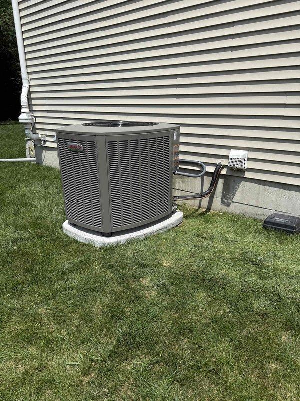 Completed full HVAC system installation including a 90,000 BTU furnace and 3.5-ton air conditioning unit with left-side configuration. Installed humidifier, reconnected all electrical and refrigerant lines, and positioned outdoor condensing unit on pad with proper drainage via PVC condensate line. All mechanical and electrical permits were obtained prior to installation, and system was tested and verified operational upon completion.