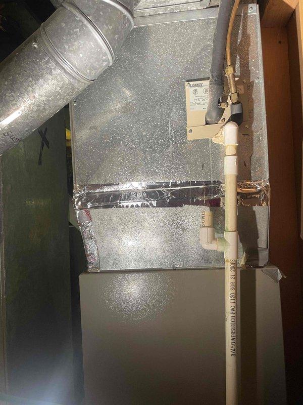 Conducted on-site evaluation of existing 20-year-old central air conditioning system for replacement estimate. Inspected outdoor condensing unit and indoor air handler components, documenting current equipment condition and installation configuration. Photographed existing HVAC infrastructure including furnace, ductwork connections, condensate drain lines, and mechanical room layout to assess replacement requirements and system compatibility. Provided comprehensive replacement estimate for new central air conditioning system with expedited installation timeline per request.