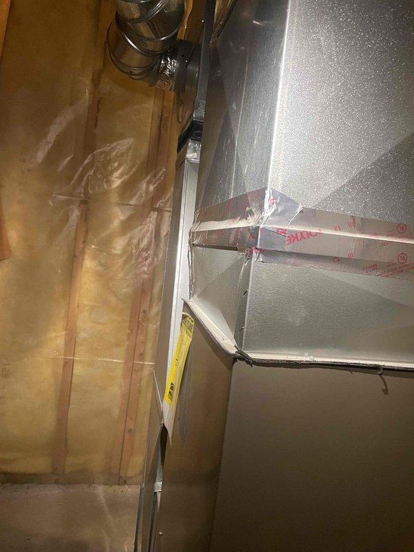Provided estimate for complete air conditioning system replacement. Existing outdoor condensing unit is 31 years old, original to the home from 1995, and has reached end of serviceable life. Evaluated current electrical panel capacity and circuit breaker configuration to ensure compatibility with new equipment installation. Assessed existing ductwork system in basement area, including supply plenum and trunk line with reflective foil tape sealing. Documented current system layout and electrical infrastructure to prepare comprehensive replacement quote for new air conditioning equipment with expedited installation timeline per homeowner's request.