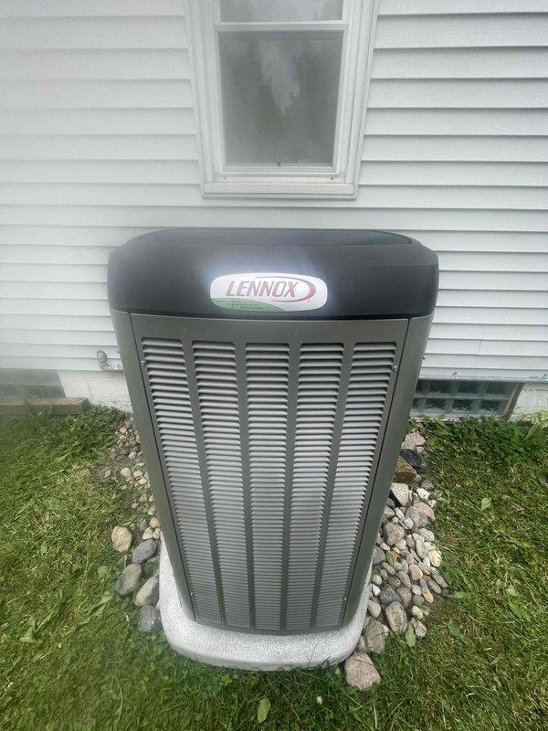 Completed installation of Lennox air conditioning system with new evaporator coil at residential property. Unit positioned on concrete pad on left side of structure with proper clearance from exterior wall and adequate service access. Connected refrigerant lines, electrical conduit, and condensate drain per manufacturer specifications. Performed system startup, verified proper refrigerant charge, tested all electrical connections, and confirmed operational parameters within normal range. System operating efficiently with no issues detected upon final inspection.