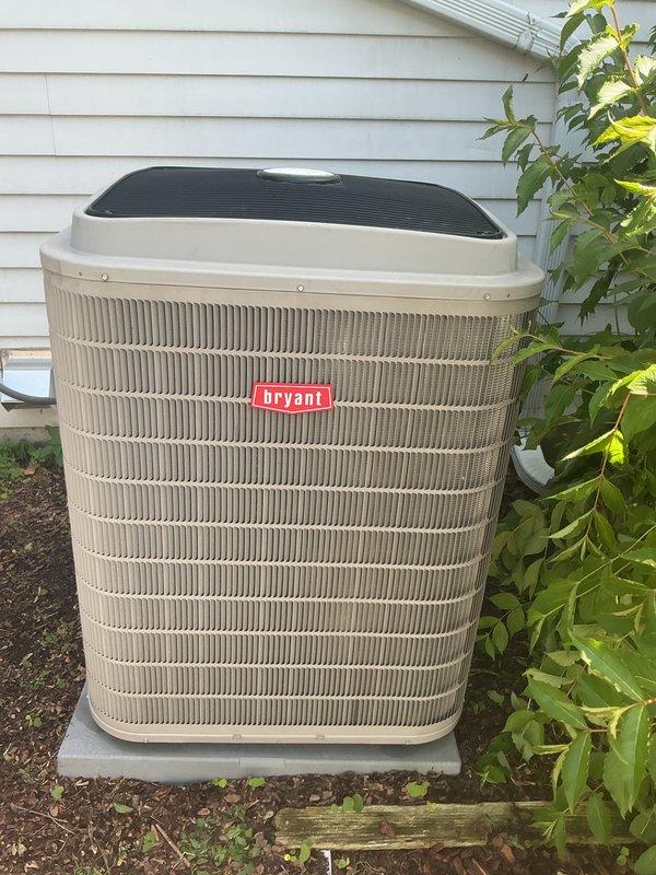 Completed annual HVAC maintenance on Bryant outdoor condensing unit per customer's service agreement renewal. Performed comprehensive system inspection, verified unit operation, and documented equipment condition with photos showing well-maintained condenser in good working order with clean coils and proper installation on concrete pad.