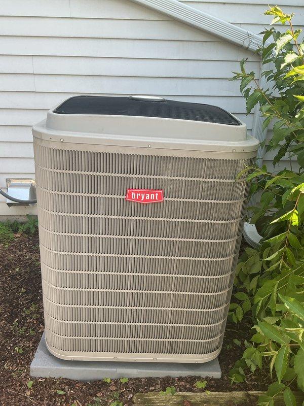 Completed annual HVAC maintenance on Bryant outdoor condensing unit per customer's service agreement renewal. Performed comprehensive system inspection, verified unit operation, and documented equipment condition with photos showing well-maintained condenser in good working order with clean coils and proper installation on concrete pad.