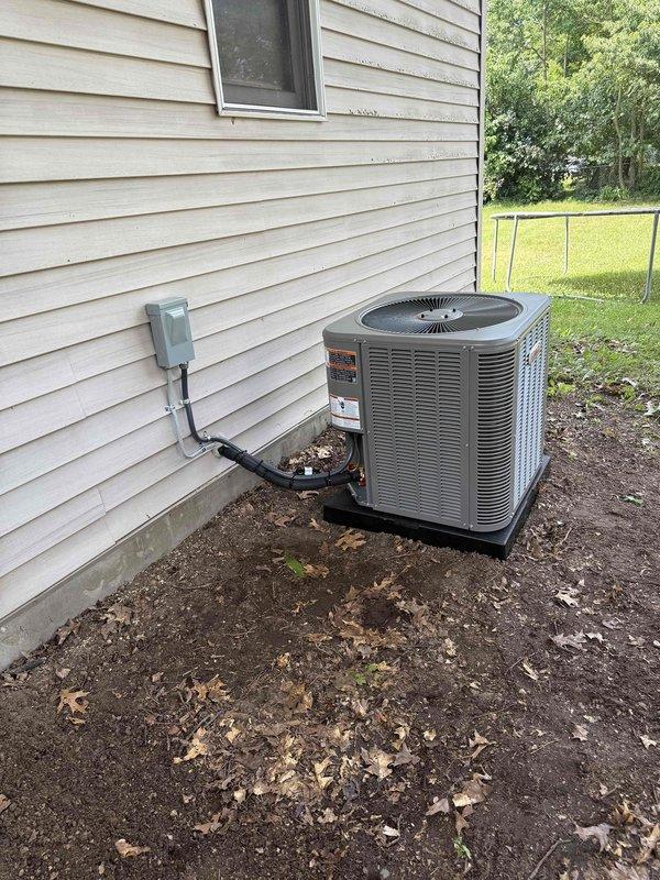 Completed installation of 2.5-ton Lennox air conditioning system with matching evaporator coil at rear of residence. Installed new outdoor condensing unit on pad, ran refrigerant lines through exterior wall, mounted electrical disconnect box, and established new dedicated electrical circuit per permit requirements. System tested and operational upon completion.