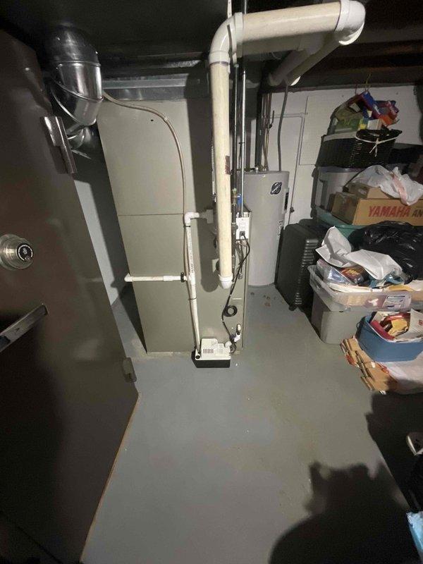 Conducted site assessment for 16-year-old furnace replacement due to cracked heating duct. Inspected existing HVAC system, documented equipment specifications, and photographed current installation including ductwork configuration and utility room layout. Provided estimate for equivalent furnace replacement to address heating system failure.