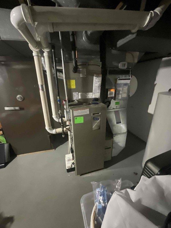 Conducted site assessment for 16-year-old furnace replacement due to cracked heating duct. Inspected existing HVAC system, documented equipment specifications, and photographed current installation including ductwork configuration and utility room layout. Provided estimate for equivalent furnace replacement to address heating system failure.