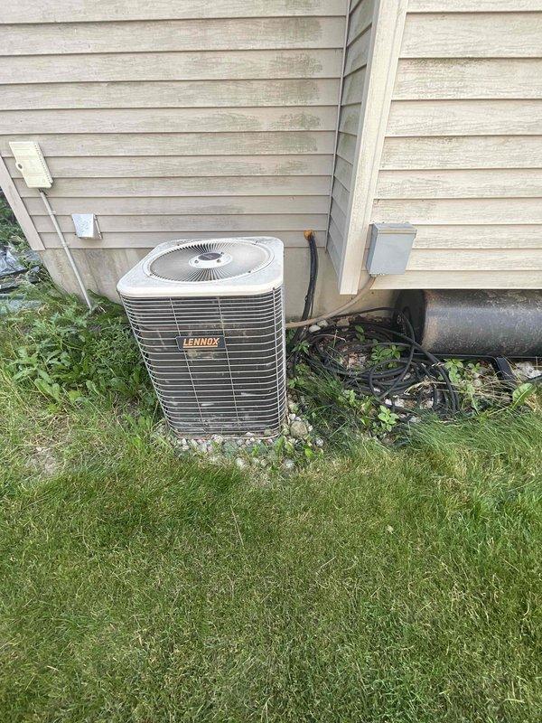 Provided comprehensive estimate for replacement of 31-year-old Lennox furnace and air conditioning system currently located in basement with outdoor condenser unit positioned on exterior side yard. Existing equipment remains operational but has exceeded typical service life expectancy, warranting full system replacement evaluation including updated efficiency options, proper sizing calculations, and installation requirements for both heating and cooling components.