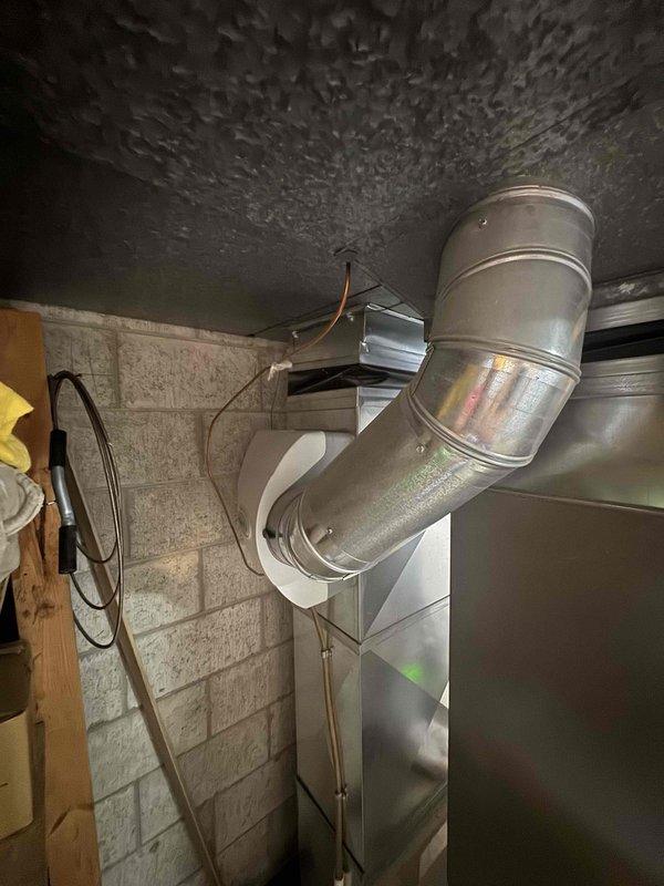 Responded to service call for non-operational air conditioning system requiring full HVAC replacement evaluation. Conducted comprehensive assessment of existing cooling and heating equipment in basement utility area. Inspected current ductwork configuration, including galvanized steel supply runs and connections to existing HVAC cabinet unit. Evaluated electrical service capacity at exterior meter location to ensure adequate power supply for new system installation. Documented existing system components, ductwork layout, and electrical infrastructure through photographic documentation. Provided detailed estimate for complete AC and furnace system replacement to address immediate cooling failure and upgrade heating equipment. Recommended expedited installation timeline based on current system failure and customer requirements.