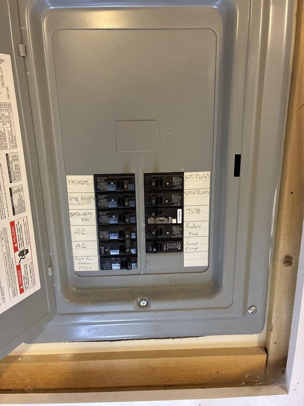 Conducted on-site evaluation for complete air conditioning system replacement. Assessed existing equipment estimated at 10-20 years old serving entire residential structure. Inspected basement mechanical room containing furnace unit and associated ductwork infrastructure. Reviewed electrical panel circuit configuration including dedicated AC breaker circuits. Documented current HVAC system condition and discussed replacement timing considerations with homeowner, including available tax credit incentives versus operating existing unit until failure. Photographed equipment and electrical service for replacement planning purposes.