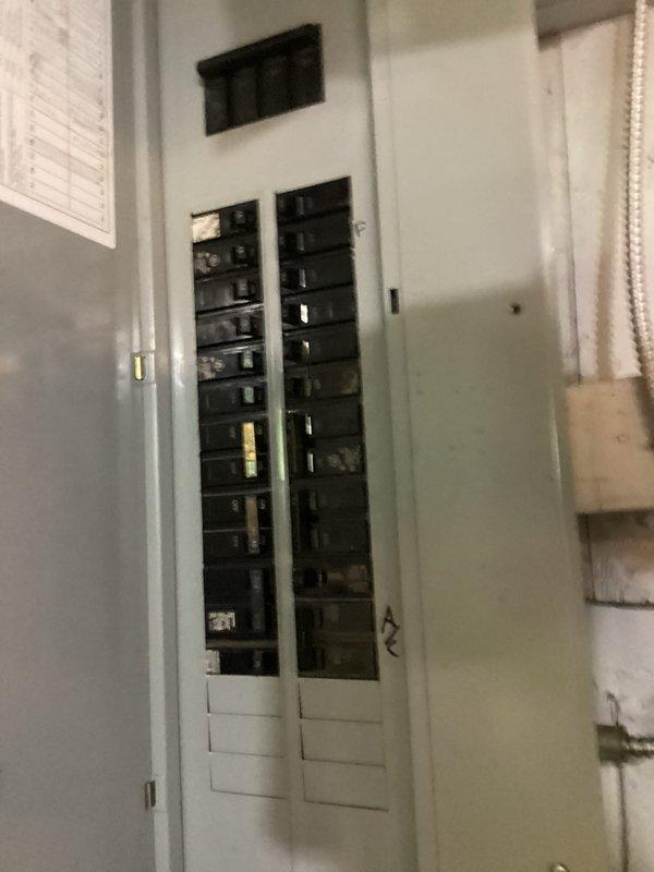 Completed electrical call-back to address code violations identified during initial furnace and air conditioning installation. Legibly marked all circuits at electrical panel per code requirements and installed proper fire blocking at all penetrations through framing members. Verified GFCI protection installed within 25 feet of new air conditioning unit and confirmed dedicated circuit meets code specifications for first-time A/C installation.