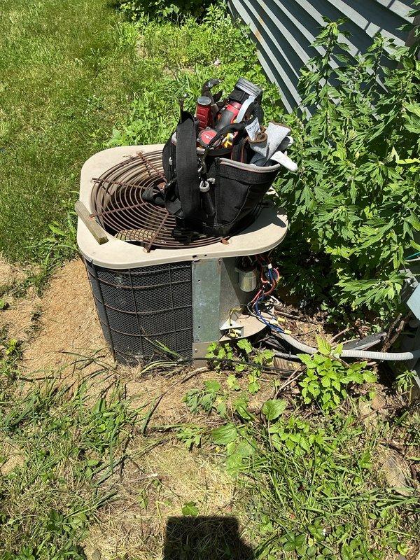 Responded to no-cool call where outdoor condensing unit was humming but producing no airflow. Upon inspection, found failed dual-run capacitor with visible signs of deterioration and electrical degradation. Replaced defective capacitor with proper replacement unit, verified all electrical connections, and restored power to system. Tested unit operation and confirmed condenser fan motor and compressor both operating normally with proper airflow restored.