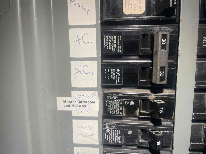 Conducted on-site evaluation for complete air conditioning system replacement. Existing outdoor condensing unit is approximately 37 years old and has reached end of serviceable life. Inspected electrical panel to verify existing circuit breaker configuration and amperage ratings for AC system, documented current 30-amp breaker setup. Measured existing air handler dimensions and clearances to determine equipment specifications for replacement unit. Assessed PVC condensate drain line routing and condition. Photographed electrical panel labeling and existing equipment measurements for accurate replacement sizing and installation planning. Provided estimate for complete system replacement with installation timeline of 2-3 weeks per owner's request.