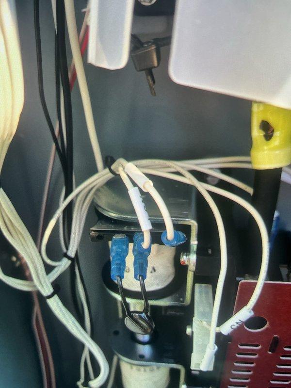 Responded to service call for Kohler 12kW generator that failed to restore power to residence after utility power was restored. Performed diagnostic inspection of generator transfer switch and control panel wiring connections. Identified issue with automatic transfer switch not properly returning to utility power position after generator shutdown. Inspected terminal connections, control wiring, and transfer switch mechanism within the generator cabinet to determine cause of transfer failure and restore proper utility power feed to the home.