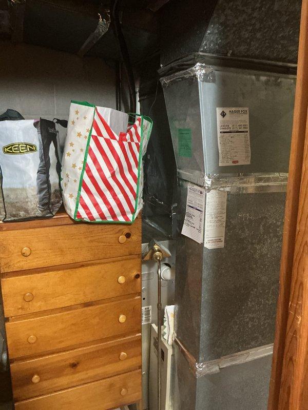 Completed annual cooling maintenance on residential HVAC system. Inspected air handler unit, verified proper operation of all components, and documented existing filter condition showing dust accumulation. System operating within normal parameters at time of service.