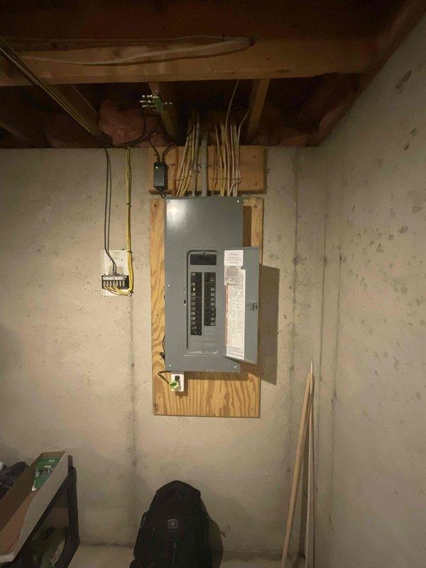 Completed electrical estimate for new whole home generator installation at residential property. Assessed existing 200-amp electrical service panel located in basement utility area with adequate clearance for transfer switch installation. Evaluated exterior propane tank placement and fuel source compatibility for generator connection. Determined optimal load requirements based on existing circuit configuration and provided specifications for automatic transfer switch, generator pad placement, and necessary electrical connections from main service panel to proposed generator location.