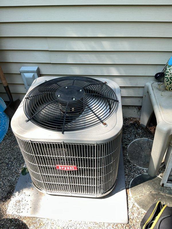 Completed annual cooling maintenance on residential air conditioning system. Inspected outdoor condenser unit and documented heavy dirt and debris accumulation on condenser coil fins, which was restricting airflow and reducing system efficiency. Performed thorough cleaning of condenser coils to remove environmental contaminants and restore proper heat transfer capability. Verified unit operation and proper assembly of all components including fan assembly and protective guards. System returned to normal operating condition following maintenance procedures.