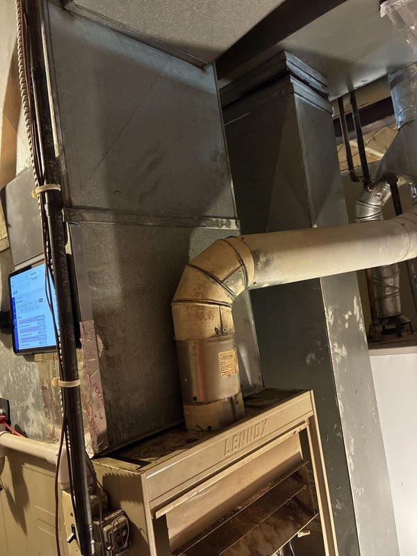 Provided estimate for furnace replacement in basement. Current 40+ year old Lennox unit is non-operational and requires complete replacement due to age and failure of critical components. Assessed existing ductwork configuration and clearances for new equipment installation.