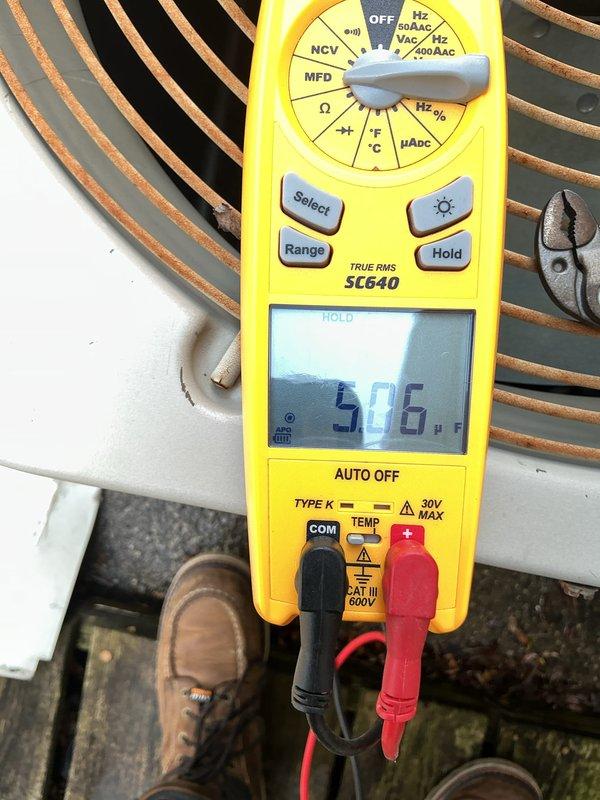 Performed comprehensive tune-up on 55+ year old outdoor HVAC unit. Conducted electrical diagnostics using digital multimeter, measuring amperage at 6.72A and voltage readings, and inspected heat exchanger coils for proper operation. All components tested within acceptable parameters and unit returned to normal operating condition.
