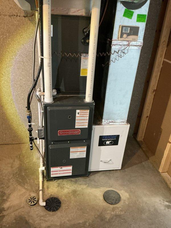 Completed annual preventive maintenance on Goodman HVAC system including basement furnace, air handler, and outdoor condensing unit. Performed comprehensive inspection of all components, verified proper operation of heating and cooling equipment, checked refrigerant lines and ductwork connections, and confirmed electrical connections at disconnect box were secure. System tested and operating within manufacturer specifications.