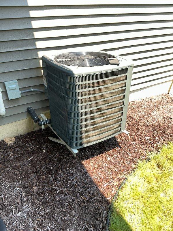 Completed annual preventive maintenance on Goodman HVAC system including basement furnace, air handler, and outdoor condensing unit. Performed comprehensive inspection of all components, verified proper operation of heating and cooling equipment, checked refrigerant lines and ductwork connections, and confirmed electrical connections at disconnect box were secure. System tested and operating within manufacturer specifications.